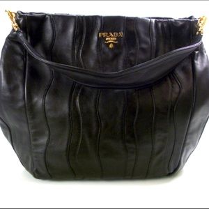 Authentic (pre-loved) Prada Nappa Stripes Shoulder Bag in Black Leather
